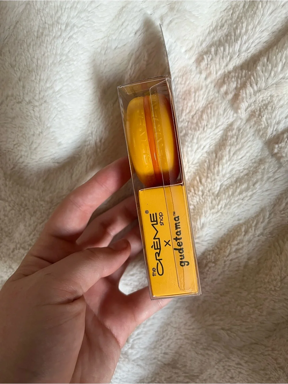 the Crème Shop x Gudetama Yellow Macaron Lip Balm - Moisturizing